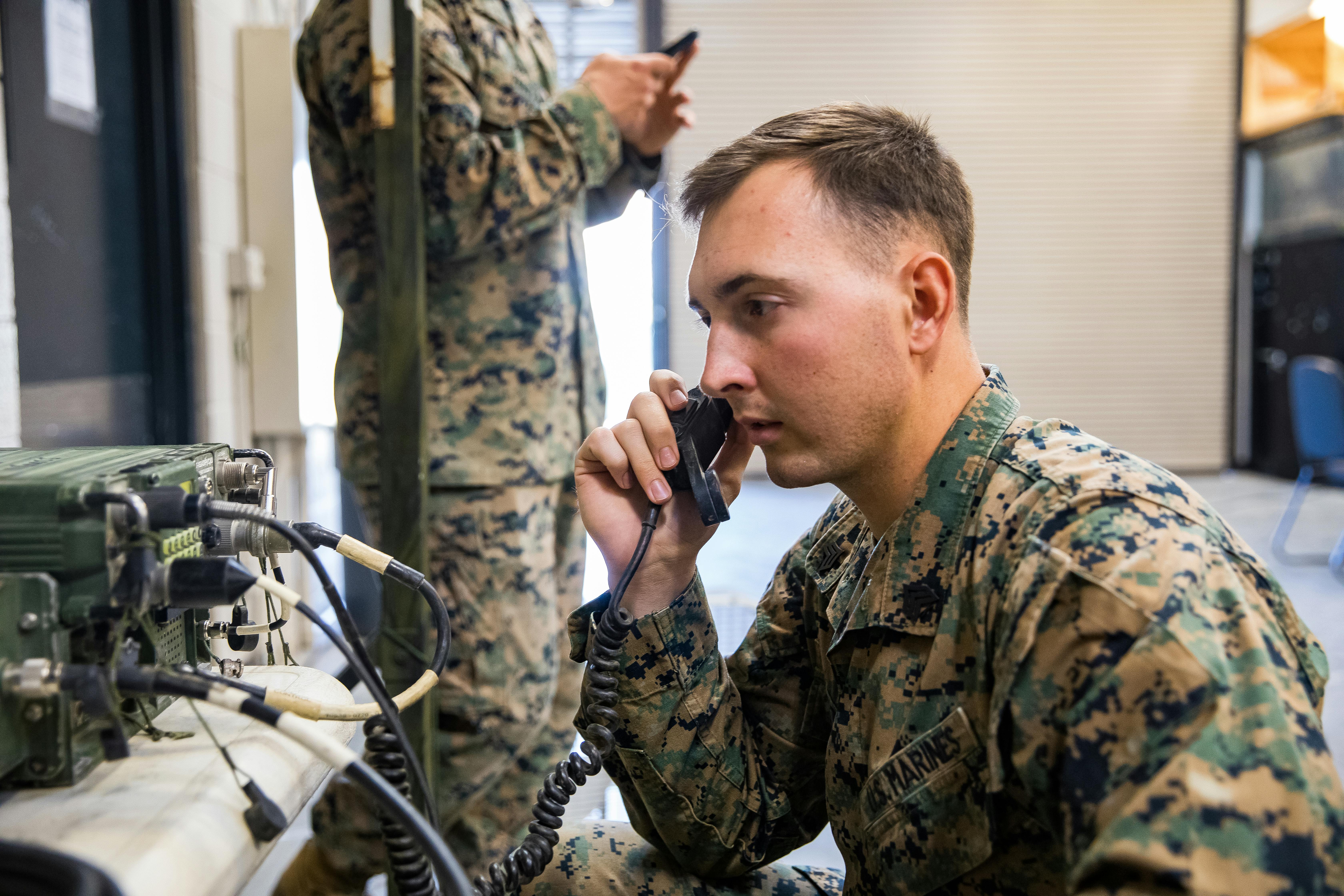 A U.S. Marine radio operator conducts a radio check during a long distance, high-frequency communications training event at Camp Pendleton, Calif.