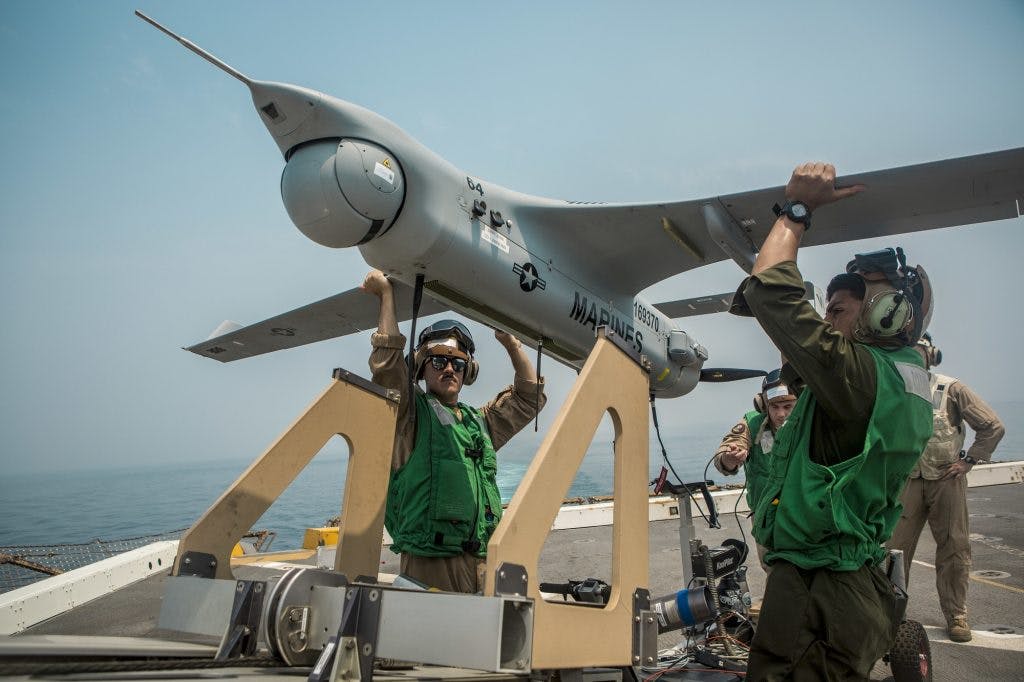 A Boeing Insitu RQ-21A Blackjack unmanned aircraft prepares for launch from a U.S. Navy vessel.