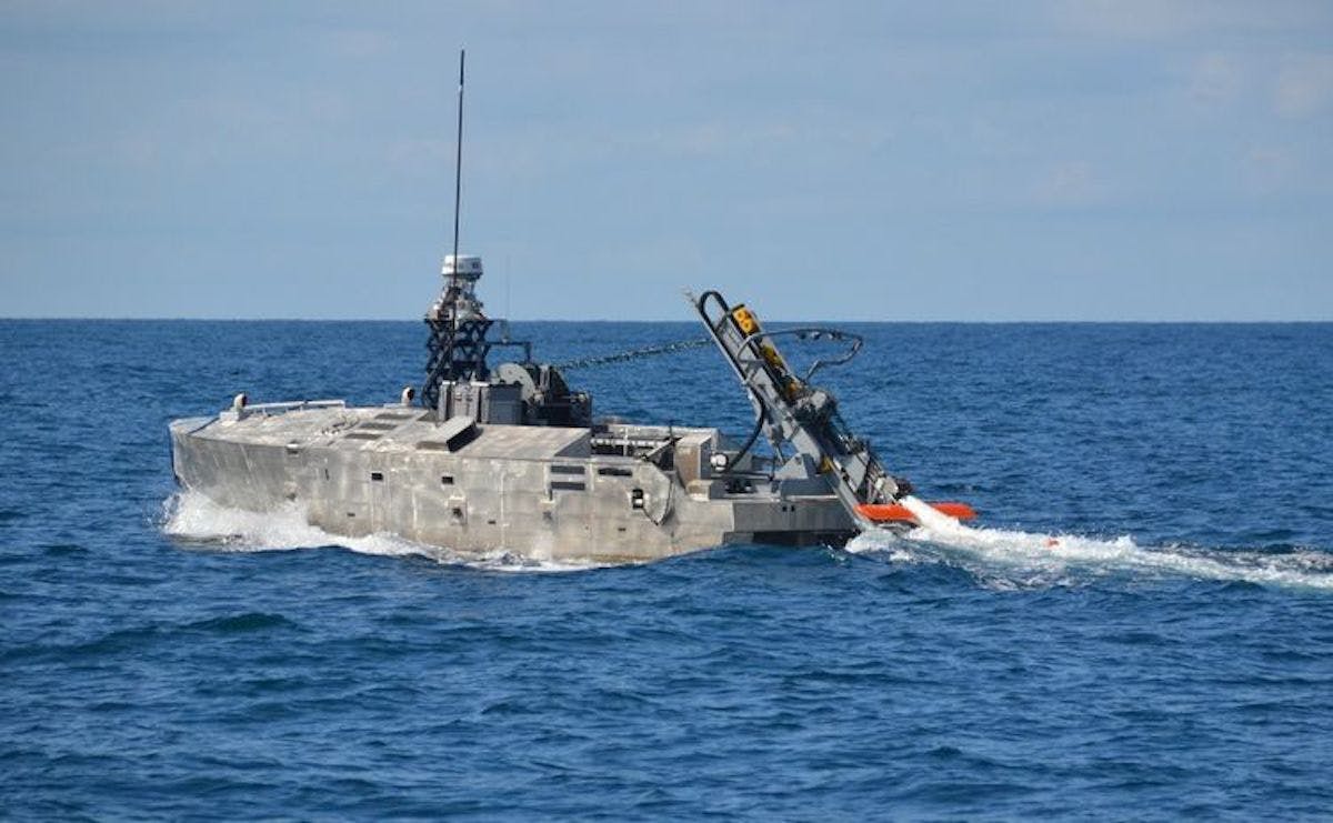 The AN/AQS-24B mine hunter being deployed from the Mine Countermeasures Unmanned Surface Vessel (MCM USV).