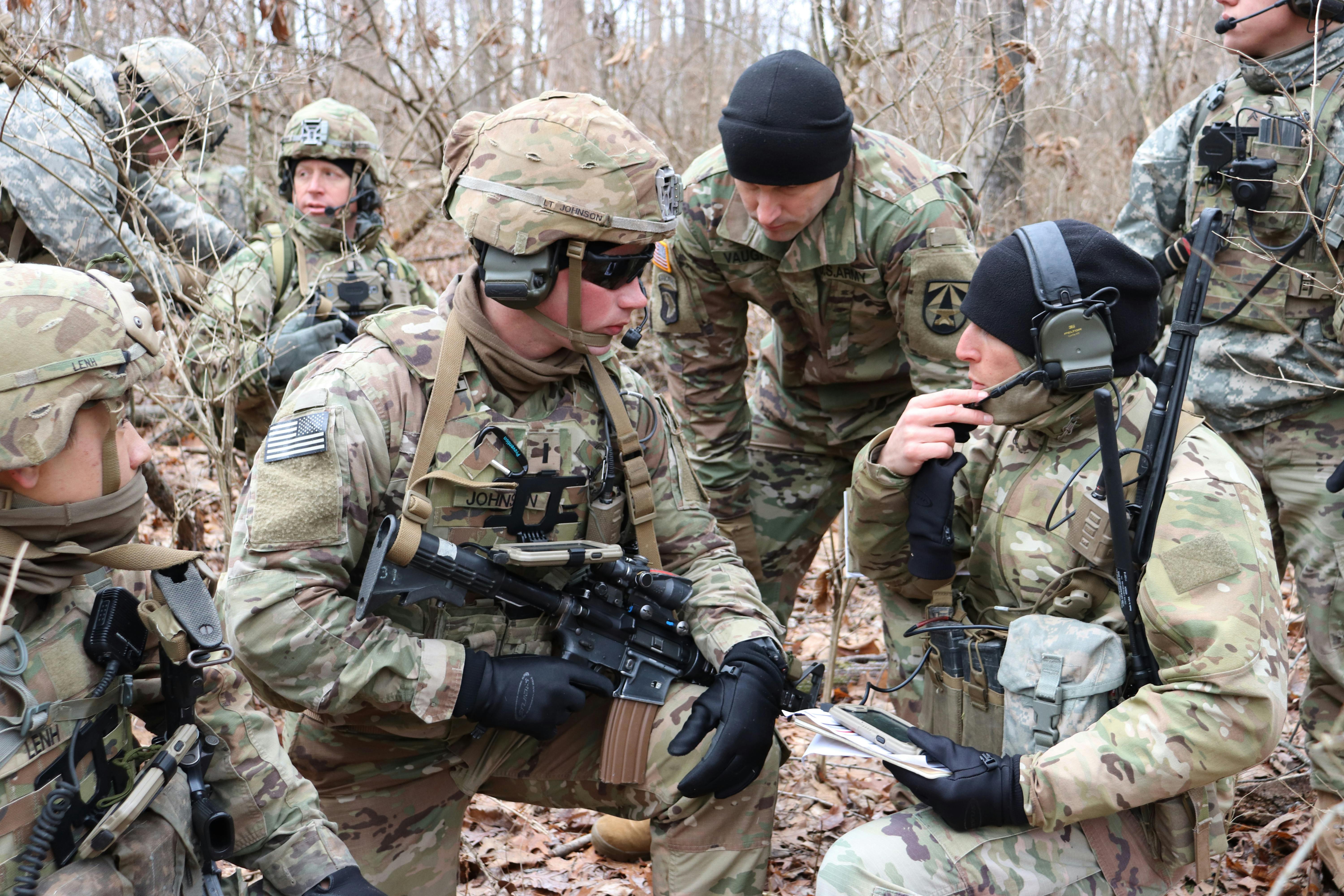 Army forward observers use integrated tactical network components during a live-fire exercise at Camp Atterbury, Ind., last January.