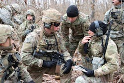 Army forward observers use integrated tactical network components during a live-fire exercise at Camp Atterbury, Ind., last January. Army forward observers use integrated tactical network components during a live-fire exercise at Camp Atterbury, Ind., last January.