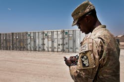 An Army soldier checks inventories refrigerated storage units, and supervises supply trucks. An Army soldier checks inventories refrigerated storage units, and supervises supply trucks.