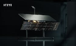 A press release photo of ICEYE's satellite in a darkened room A press release photo of ICEYE's satellite in a darkened room