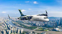 A rendering of a hydrogen-powered airbus commercial aircraft flying over a city