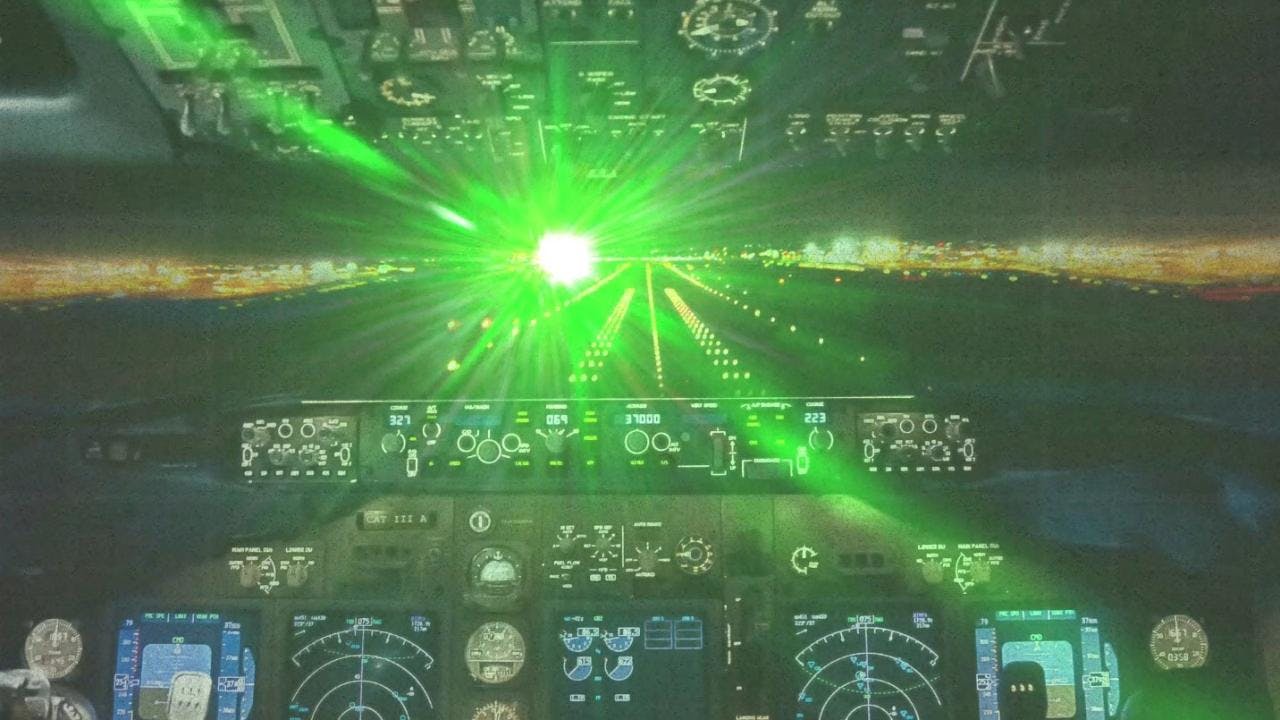 A laser shining into a cockpit