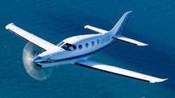 A photo of the E1000 AX in flight A photo of the E1000 AX in flight