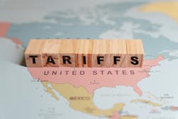 letter blocks spelling 'tariffs' over a map of the U.S. letter blocks spelling 'tariffs' over a map of the U.S.