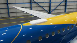 A photo of the Intelsat receiver on top of an Embraer plane