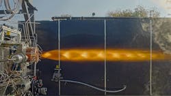 An imagine in profile of a rocket engine emitting a large flame horizontally An imagine in profile of a rocket engine emitting a large flame horizontally