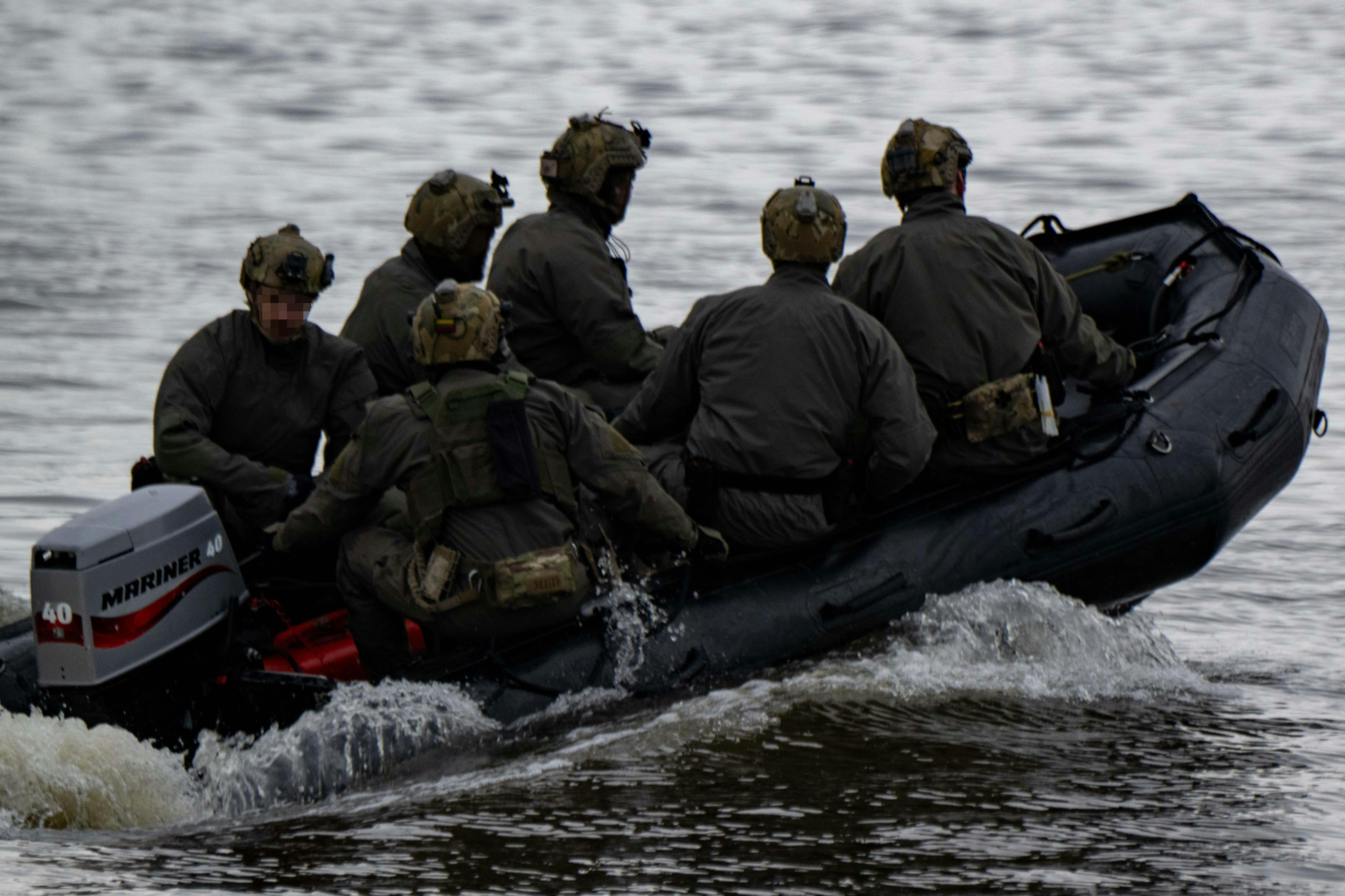 U.S. Naval Special Warfare Operators (SEALs) conduct maritime training with Lithuanian and German special operations forces.