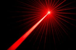 a red laser among a black background a red laser among a black background