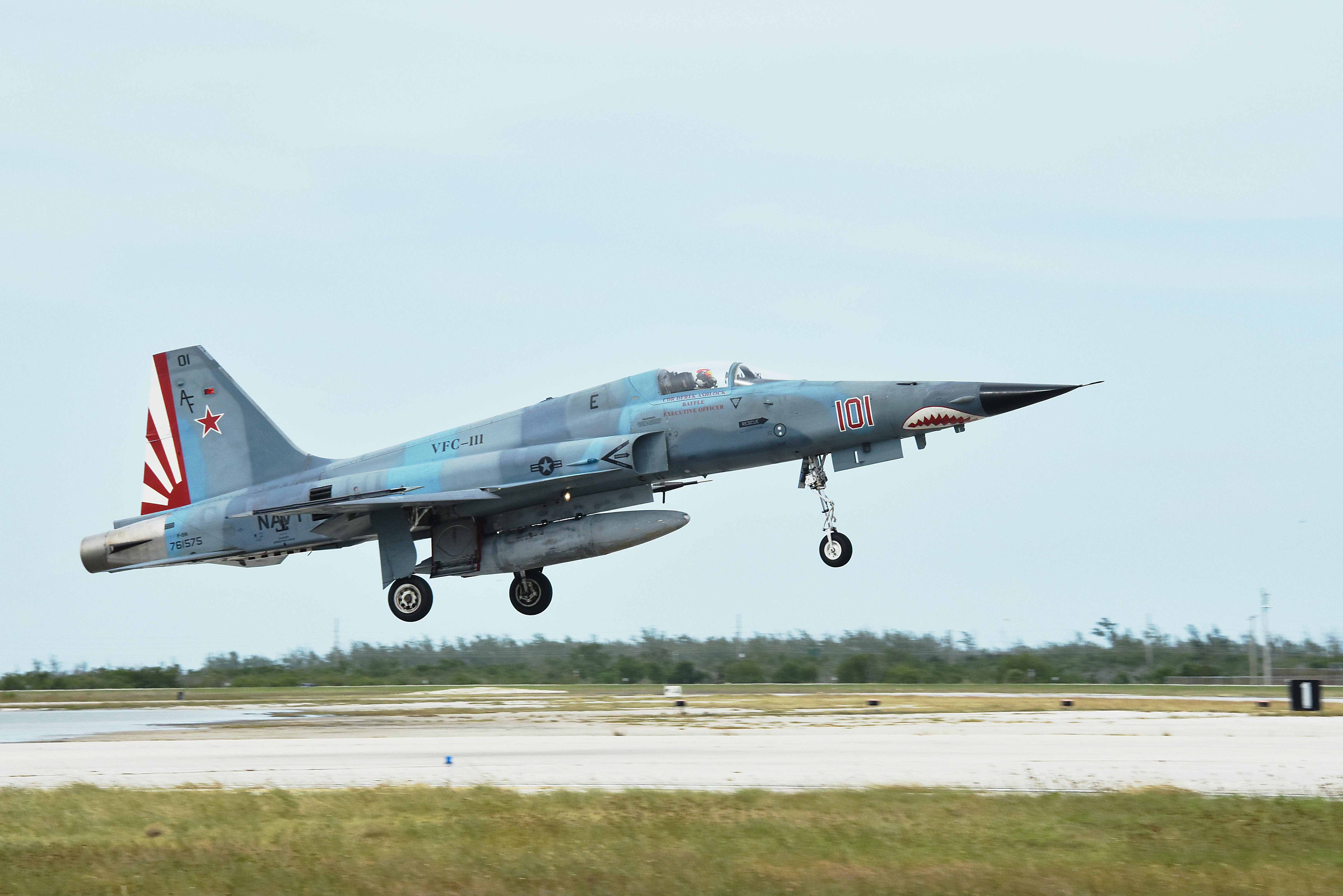 A U.S. Navy F-5N Tiger-II from a adversary training squadron takes off from Naval Air Station Key West. Adversary squadrons use the Northrop Grumman F-5 for air combat maneuvering training.