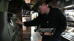 A Navy sonar technician conducts routine electronics inspections aboard the fast-attack submarine USS Virginia (SSN 774) earlier this year.