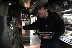 A Navy sonar technician conducts routine electronics inspections aboard the fast-attack submarine USS Virginia (SSN 774) earlier this year. A Navy sonar technician conducts routine electronics inspections aboard the fast-attack submarine USS Virginia (SSN 774) earlier this year.
