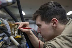 An Air Force electronic warfare systems technician, works on an AN/ALQ-184 electronic countermeasures pod at Misawa Air Base, Japan, last month. An Air Force electronic warfare systems technician, works on an AN/ALQ-184 electronic countermeasures pod at Misawa Air Base, Japan, last month.