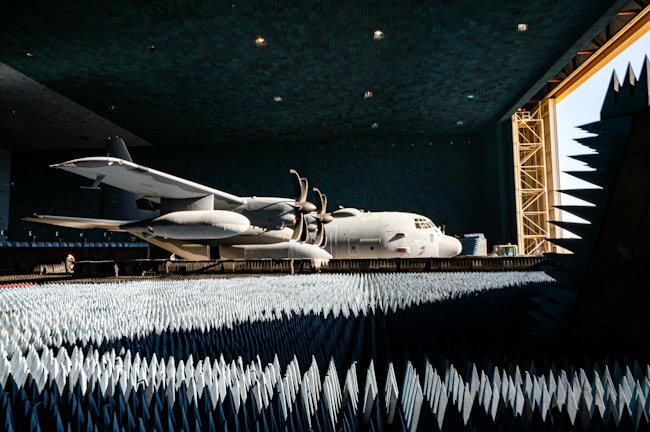 An AC-130J Ghostrider is loaded into the Benefield Anechoic Facility at Edwards Air Force Base last March for electronic weapons countermeasures testing
