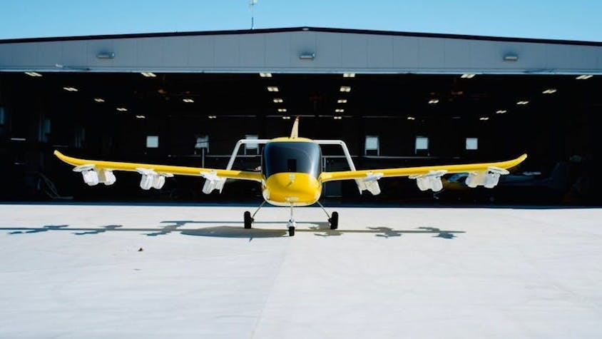 A photo of a Wisk Aero aircraft outside a hangar