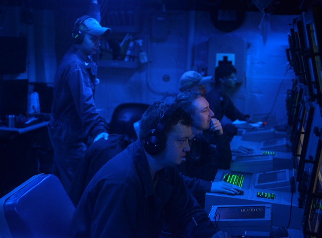 Sonar Technicians monitor the screens aboard the Arleigh Burke-class guided-missile destroyer USS Lassen (DDG 82) during UNITAS LXIII in 2022.
