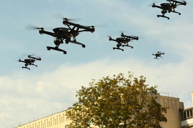 A swarm of five UAVs flying
