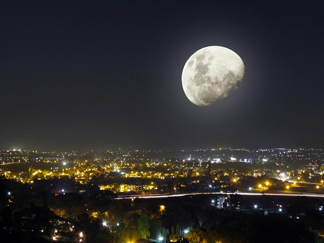 The moon over a city