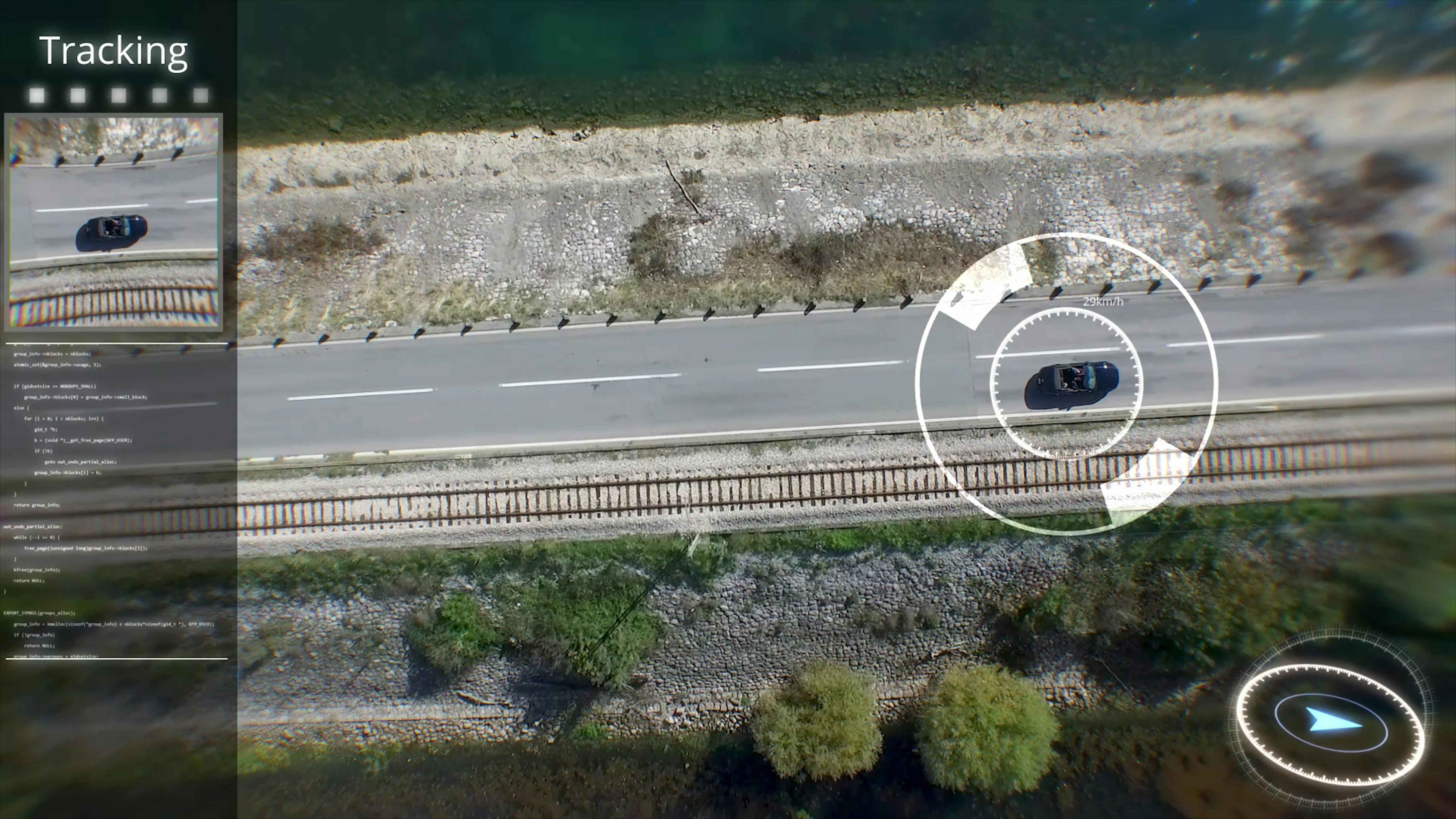 Digital composite video depicts a reconnaissance uncrewed aircraft as it keeps watch on moving vehicles.