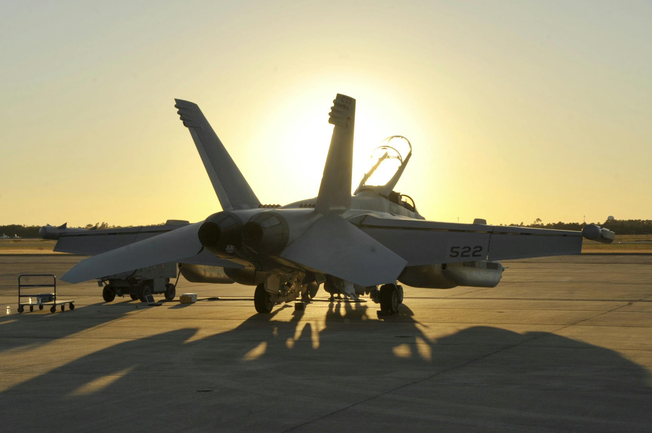 A Navy EA-18G Growler with Electronic Attack Squadron VAQ-135 Black Ravens at Naval Air Station Whidbey Island, Wash., is maintained by its crew.