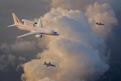 An artist’s rendering of a Royal Australian Air Force E-7A Wedgetail teaming with two MQ-28 Ghost Bat collaborative combat aircraft. Boeing illustration. An artist’s rendering of a Royal Australian Air Force E-7A Wedgetail teaming with two MQ-28 Ghost Bat collaborative combat aircraft. Boeing illustration.