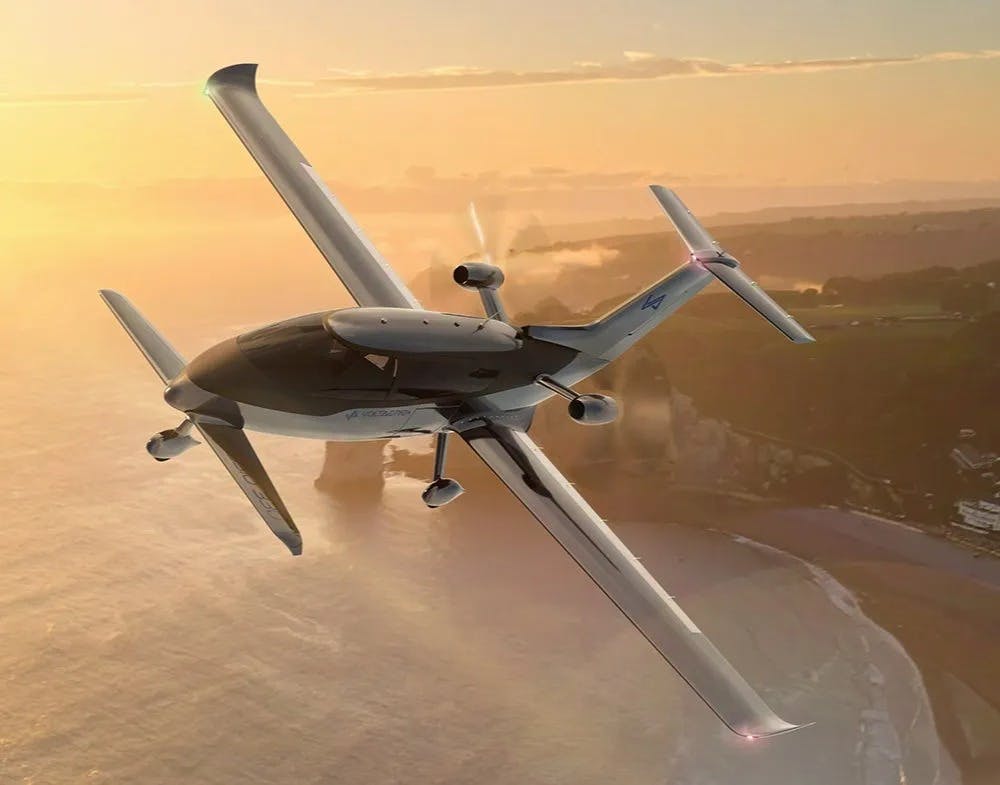 A rendering of the VoltAero Cassio 330 flying over a shoreline