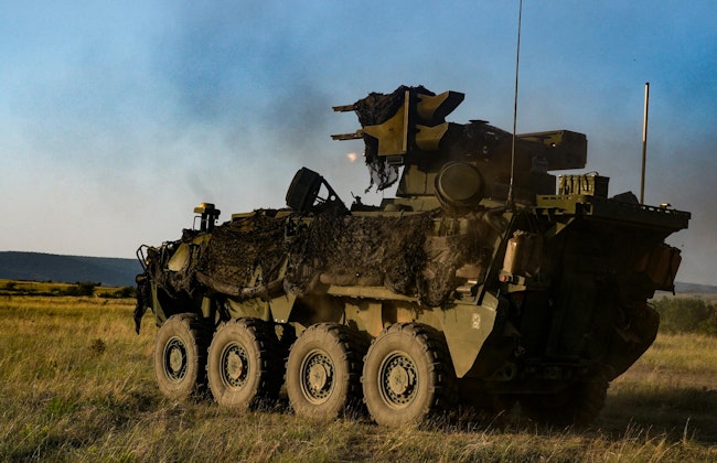 U.S. soldiers engage targets in the Sgt. Stout air defense artillery vehicle -- a Stryker A1 variant.