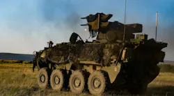 U.S. soldiers engage targets in the Sgt. Stout air defense artillery vehicle -- a Stryker A1 variant.