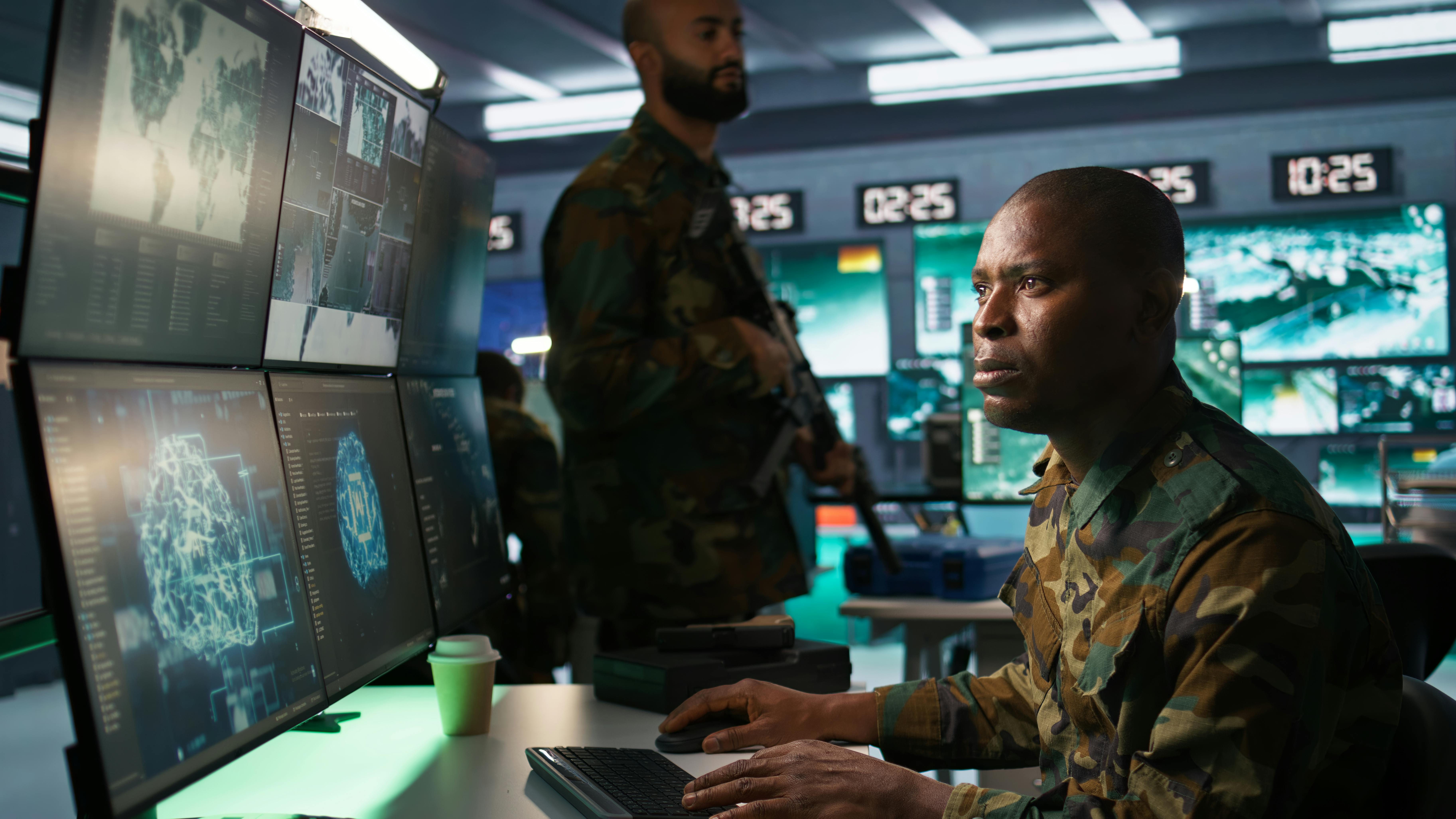 A military IT specialist uses artificial intelligence in military planning and decision making.