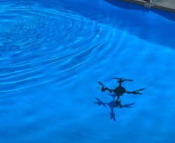 A still from Adnrei Copachi's video demonstrating the flight and underwater capabilities of the project's hybrid quadcopter. Credit: Andrei Copachi. A still from Adnrei Copachi's video demonstrating the flight and underwater capabilities of the project's hybrid quadcopter. Credit: Andrei Copachi.