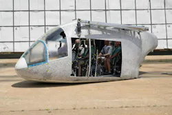 An aircraft body modeled after an air taxi with weighted test dummies inside is shown after a drop test at NASA’s Langley Research Center in Hampton, Virginia. The test was completed June 26 at Langley’s Landing and Impact Research Facility. The aircraft was dropped from a tall steel structure, known as a gantry, after being hoisted about 35 feet in the air by cables. NASA researchers are investigating aircraft materials that best absorb impact forces in a crash. NASA/Mark Knopp photo.