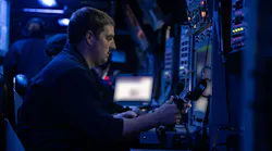 A U.S. Navy sailor stands watch in the combat information center aboard the Arleigh Burke-class guided-missile destroyer USS Wayne E. Meyer (DDG 108) last month. The ship uses the CEC battle-management and networking system.
