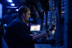 A U.S. Navy sailor stands watch in the combat information center aboard the Arleigh Burke-class guided-missile destroyer USS Wayne E. Meyer (DDG 108) last month. The ship uses the CEC battle-management and networking system. A U.S. Navy sailor stands watch in the combat information center aboard the Arleigh Burke-class guided-missile destroyer USS Wayne E. Meyer (DDG 108) last month. The ship uses the CEC battle-management and networking system.