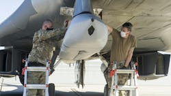A weapon loader crew uploads a Joint Air-to-Surface Standoff Missile to an external pylon on a B-1B Lancer at Edwards Air Force Base, Calif., last December. A weapon loader crew uploads a Joint Air-to-Surface Standoff Missile to an external pylon on a B-1B Lancer at Edwards Air Force Base, Calif., last December.