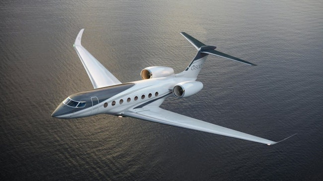 An image of Gulfstream's G800 flying above water.