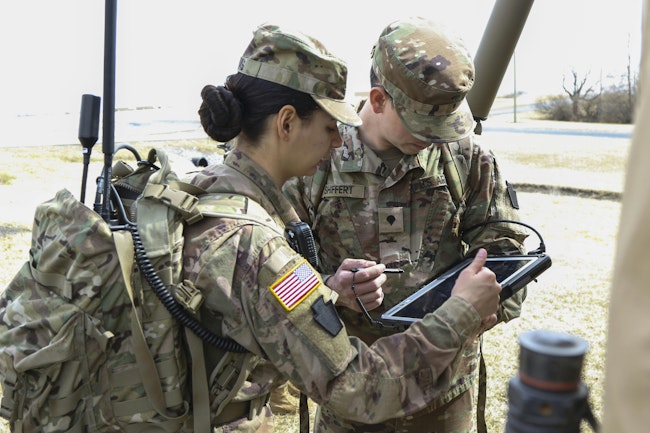 An Army National Guard cryptologic linguist trains in 2022 on a new tactical dismounted electronic warfare and signals intelligence (TDEWS) system at Fort Indiantown Gap, Pa.