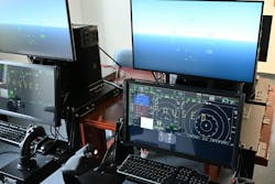 Desktop trainers display naval aviation's new carrier-based joint air training program in a lab at the Naval Air Warfare Center Aircraft Division near its Patuxent River Naval Air Station, Md., in 2024. Desktop trainers display naval aviation's new carrier-based joint air training program in a lab at the Naval Air Warfare Center Aircraft Division near its Patuxent River Naval Air Station, Md., in 2024.