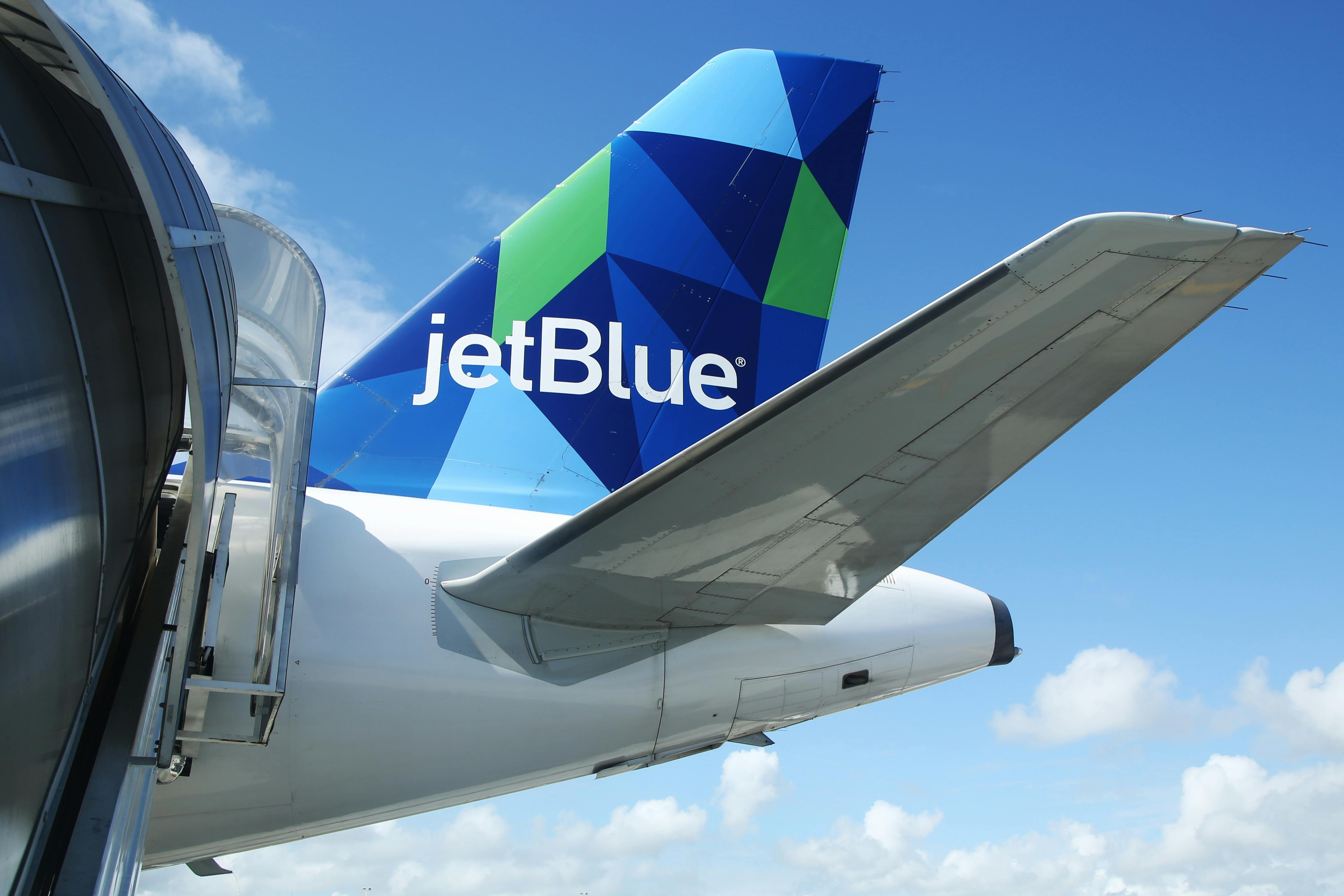 A photo of a JetBlue tail end on an aircraft.