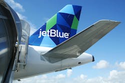 A photo of a JetBlue tail end on an aircraft. A photo of a JetBlue tail end on an aircraft.
