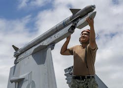 A Navy aviation ordnanceman secures an AIM-9X air-to-air missile to an F/A-18F Super Hornet during the Rim of the Pacific (RIMPAC) exercise in 2024. A Navy aviation ordnanceman secures an AIM-9X air-to-air missile to an F/A-18F Super Hornet during the Rim of the Pacific (RIMPAC) exercise in 2024.