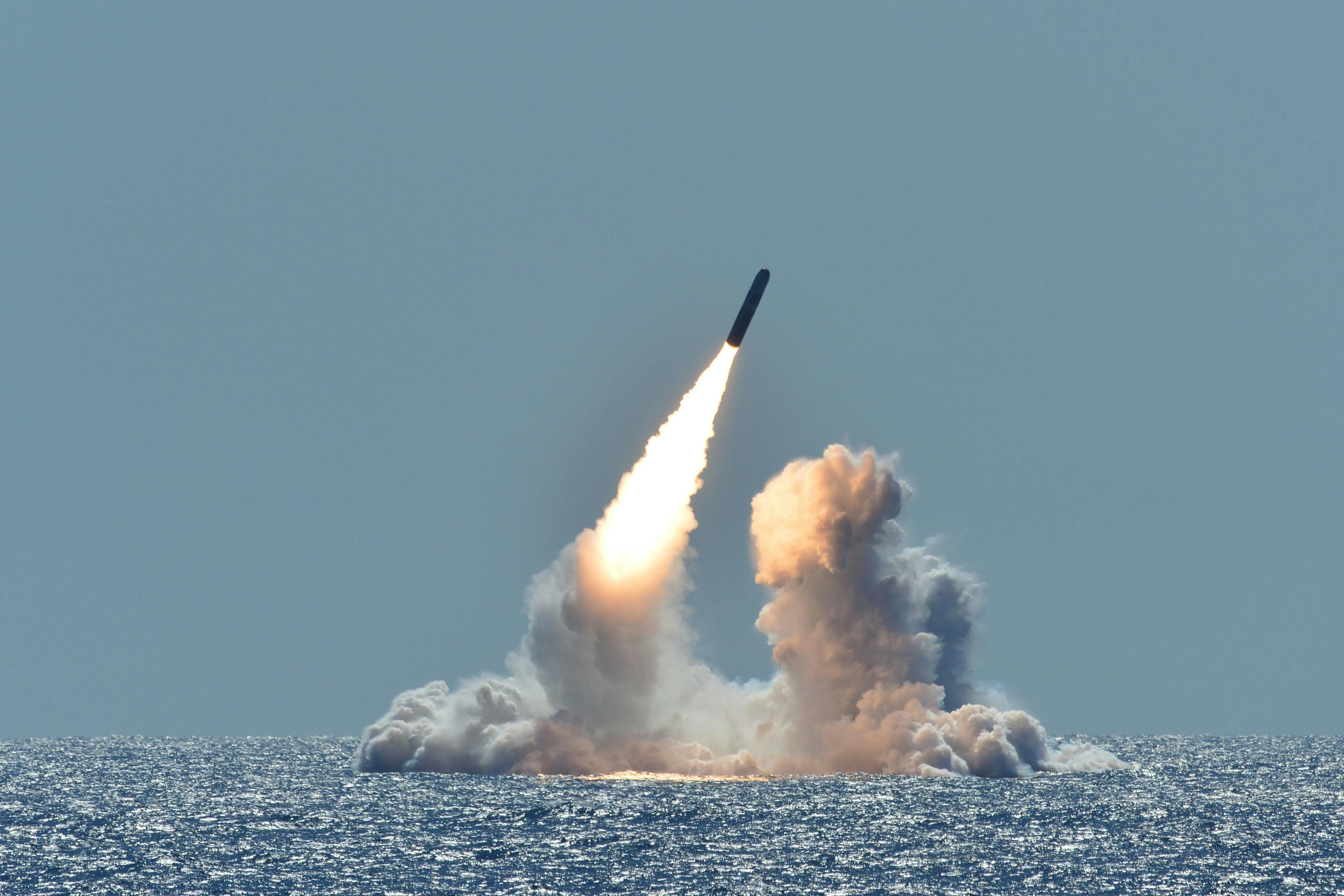 An unarmed Trident II D5 missile launches from the Ohio-class ballistic missile submarine USS Nebraska (SSBN 739) off the coast of California.