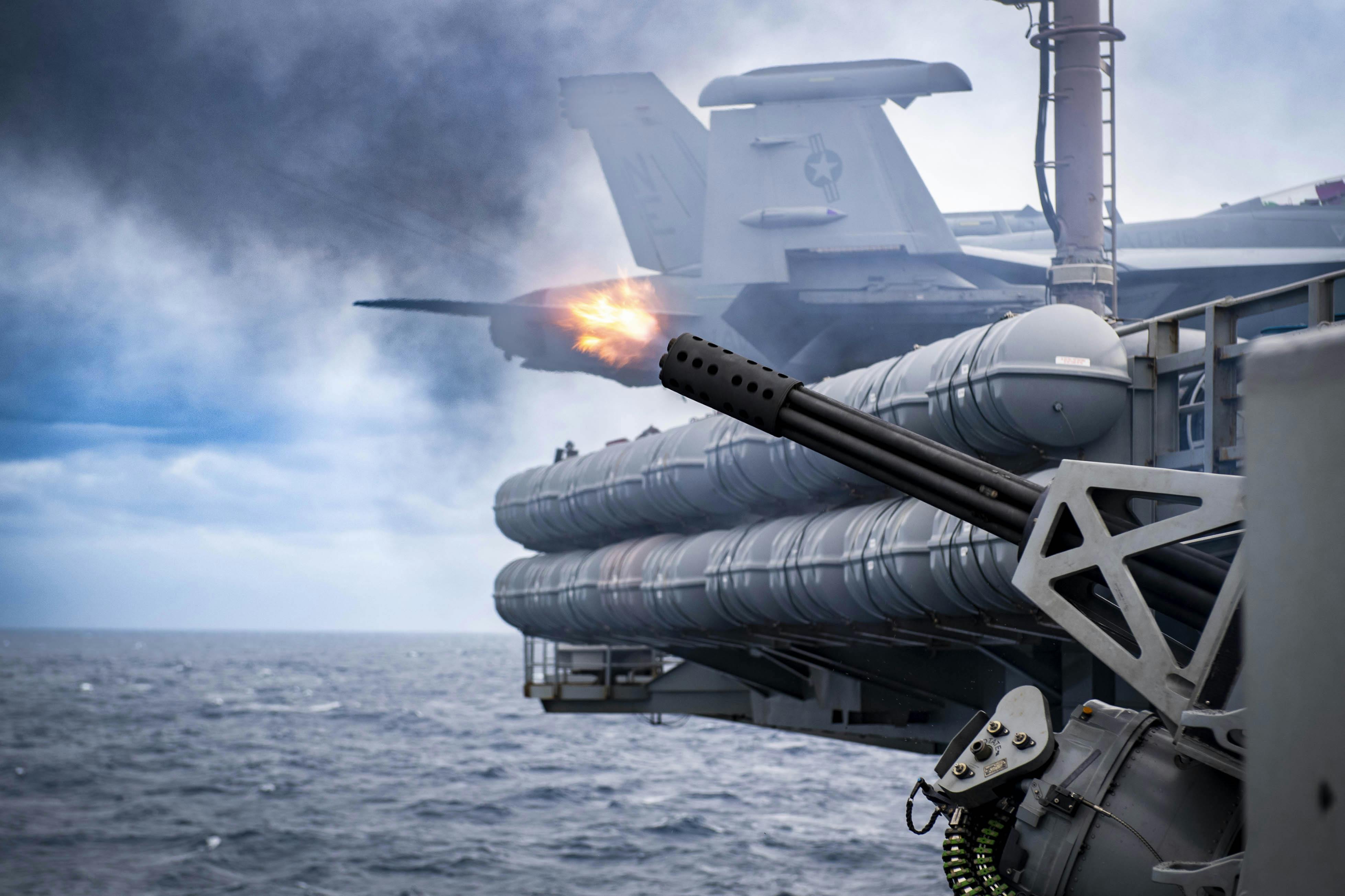The aircraft carrier USS Carl Vinson (CVN 70) fires a MK 15 Phalanx close-in weapon system during a live-fire exercise in 2023