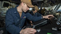 A Navy bridge officer monitors an AN/SPS-73(V) surface-search radar aboard the aircraft carrier USS George H.W. Bush (CVN 77) in March 2022. A Navy bridge officer monitors an AN/SPS-73(V) surface-search radar aboard the aircraft carrier USS George H.W. Bush (CVN 77) in March 2022.