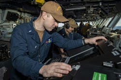 A Navy bridge officer monitors an AN/SPS-73(V) surface-search radar aboard the aircraft carrier USS George H.W. Bush (CVN 77) in March 2022. A Navy bridge officer monitors an AN/SPS-73(V) surface-search radar aboard the aircraft carrier USS George H.W. Bush (CVN 77) in March 2022.