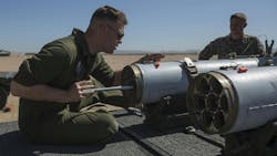 A U.S. Marine aviation ordnance system technician loads a 2.75-inch rocket configured with Advanced Precision Kill Weapon System II into an LAU-68 F/A rocket launcher at Yuma Marine Corps Air Station, Ariz., last March. A U.S. Marine aviation ordnance system technician loads a 2.75-inch rocket configured with Advanced Precision Kill Weapon System II into an LAU-68 F/A rocket launcher at Yuma Marine Corps Air Station, Ariz., last March.