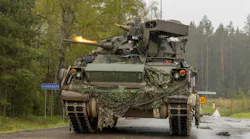 The U.S. 7th Cavalry Regiment starts a simulated firefight while in a M2A4 Bradley Fighting Vehicle during Exercise Hedgehog 25 near Camp Reedo, Estonia, last May 2025.