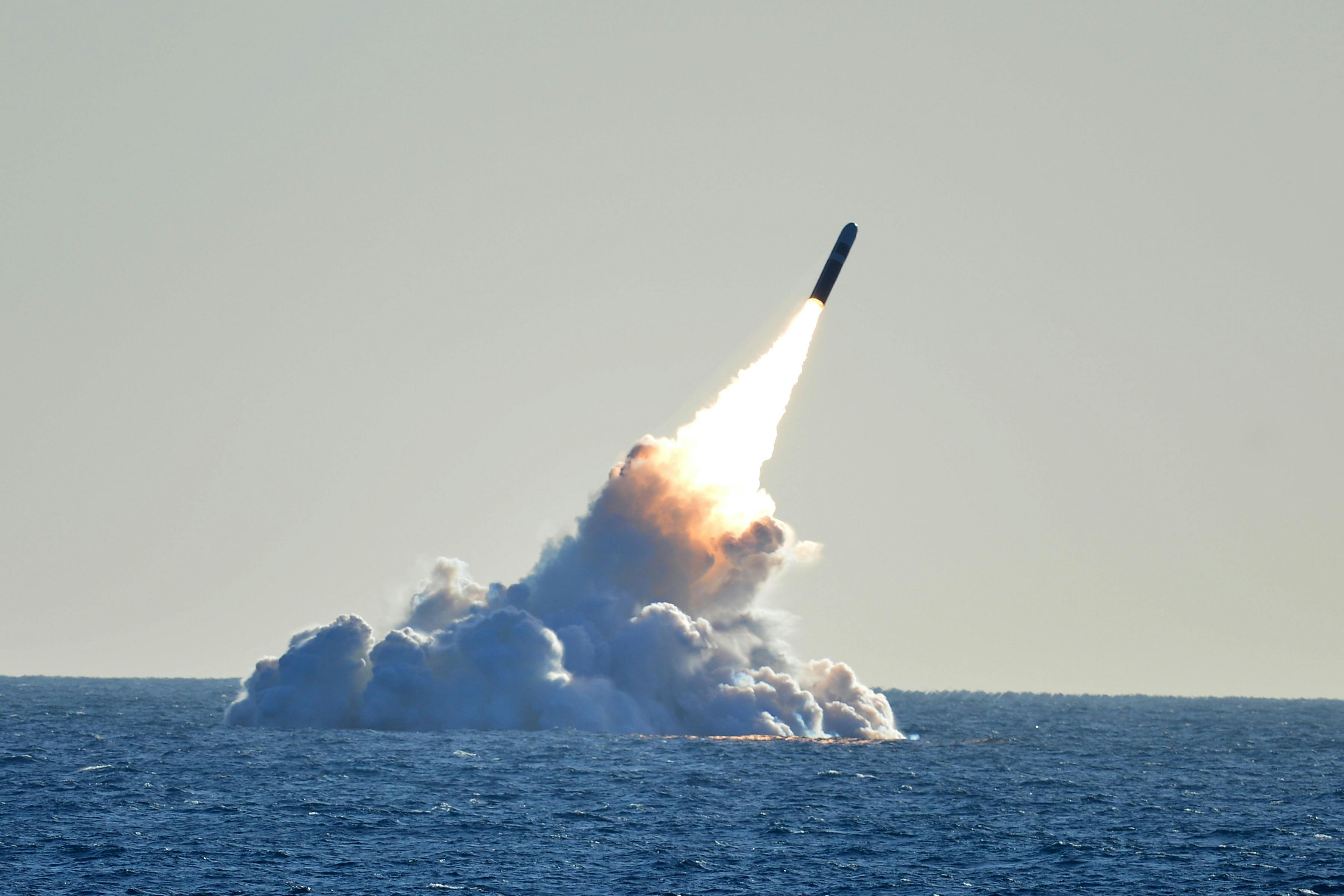 An unarmed Trident II D5 missile launches from the Ohio-class ballistic missile submarine USS Nebraska (SSBN 739) off the coast of California.
