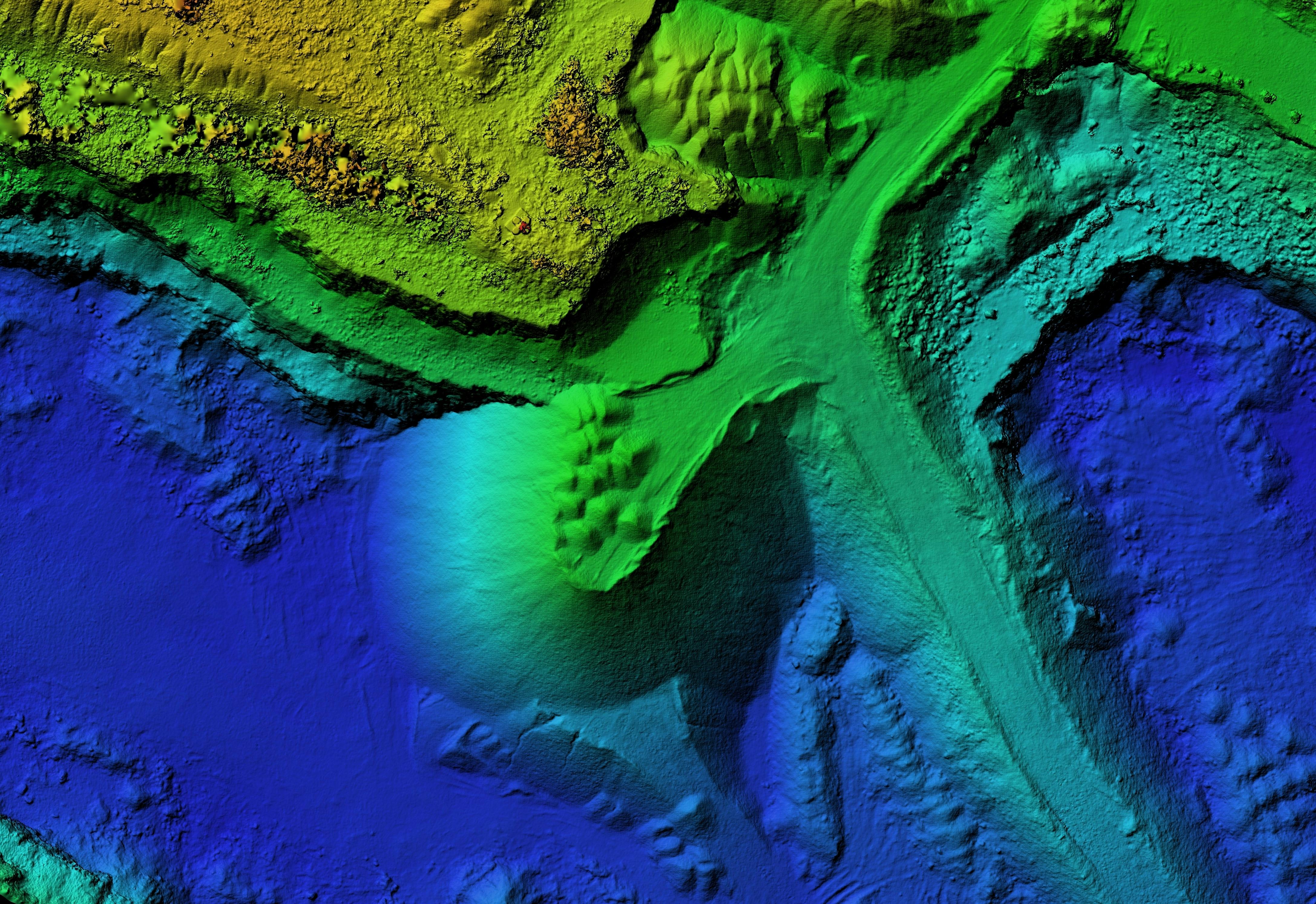 Digital elevation model of a quarry for GIS usage. Model of a mine elevation. GIS product made after processing aerial pictures taken from a drone. It shows excavation site with steep rock walls